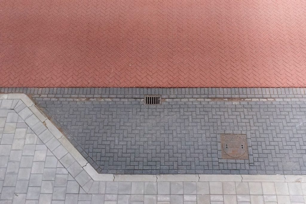 pexels photo 34382364 Overhead shot showing diverse paving patterns in vibrant colors.